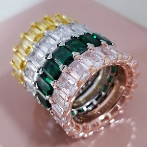 Set of five stackable eternity rings with colorful rectangle cut zircon stones