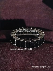 Detail showing ring dimensions with black baguette-cut cubic zirconia in silver setting