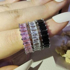Luxury full eternity band rings with emerald-cut zircon stones in black, pink, and white