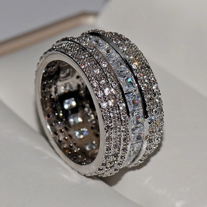 Macro shot of wide multi-row micro-pave ring with sparkling square cut cubic zirconia