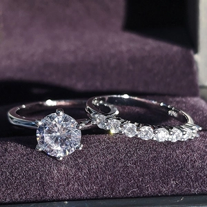 Elegant silver stackable wedding ring set featuring a large round cubic zirconia solitaire
