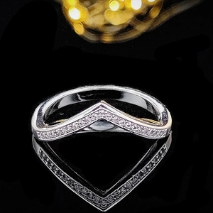 Polished silver chevron V-shaped ring with pavé-set sparkling zircon stones for women