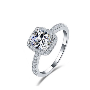 Luxury cushion cut halo ring in silver with pavé set side stones for women
