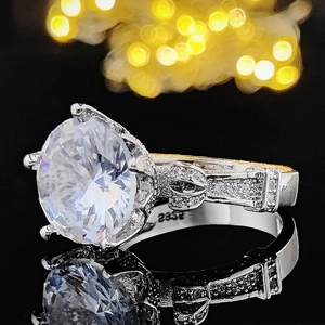 Luxurious vintage S925 silver engagement ring with large round zircon on black background