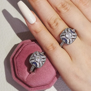 Vintage art deco ring set with blue sapphire and clear zircon in pink velvet box
