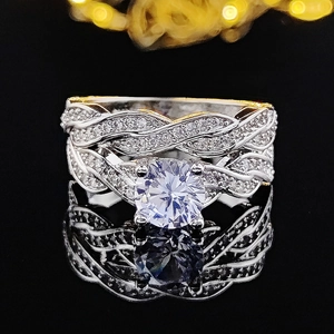 Exquisite silver woven band ring with round brilliant cut center stone and pavé accents