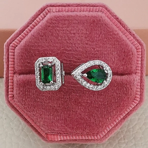 Luxury green zircon jewelry set featuring emerald cut and teardrop earrings in silver
