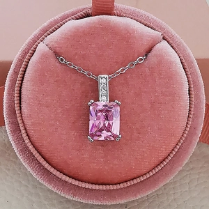 Exquisite necklace featuring rectangle pink zircon pendant on a silver chain in velvet box