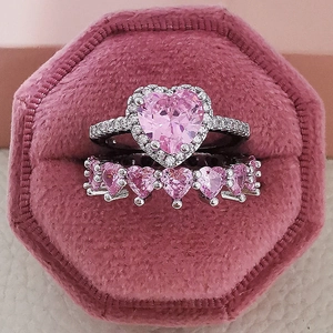 Pink heart diamond halo ring set in a luxury velvet jewelry box for women