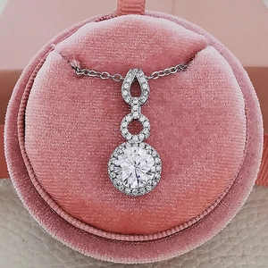 Three-tier concentric knot teardrop halo pendant necklace in S925 sterling silver