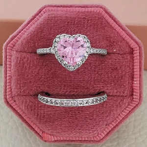Romantic pink heart-shaped crystal ring set with pavé accents in a velvet box