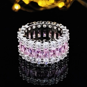 Eleganter dreireihiger Silberring mit rosa Zirkonia im Rechteckschliff und weißen Steinen