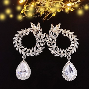 Elegant silver drop earrings with marquise leaves and large pear-cut cubic zirconia stones