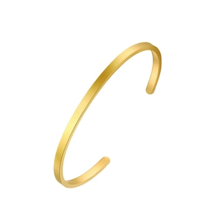 Minimalist adjustable open gold bangle with a brushed matte metallic texture finish