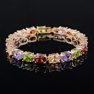 Bracelet élégant en or rose avec pierres précieuses multicolores de coupe ovale