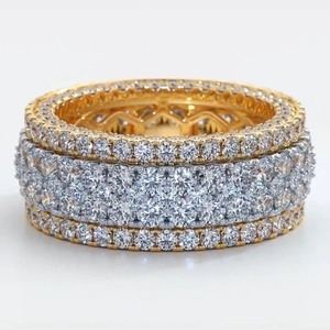 Three-layer wide pavé ring featuring gold and silver tones with clear cubic zirconia