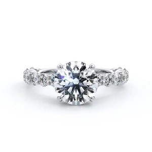 Classic silver engagement ring with round zircon center stone and side row diamonds