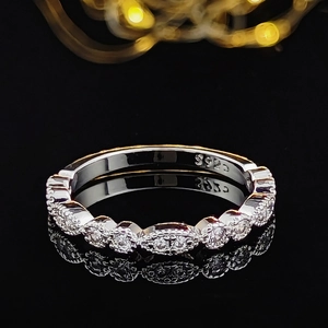 Detail view of S925 sterling silver ring featuring marquise and round cut cubic zirconia