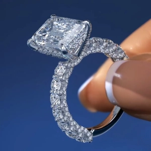Luxury square-cut zircon ring with pavé-set diamonds on polished silver band
