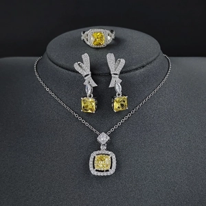 Luxury 3-piece geometric jewelry set with yellow zircon stones, necklace, ring and earrings