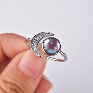 Elegant S925 sterling silver moon ring featuring a glowing moonstone and tiny crystals