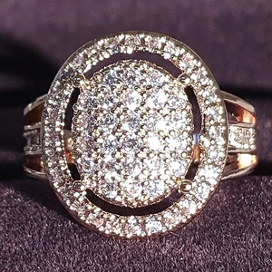 Luxurious 18k rose gold plated halo ring with sparkling pavé cubic zirconia gemstones