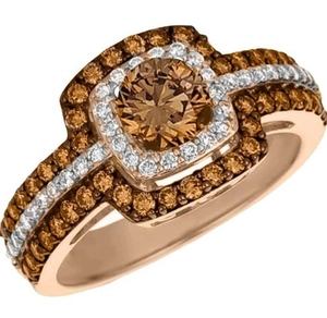Macro shot of 14k rose gold plated ring with champagne gemstone and micro pavé crystals