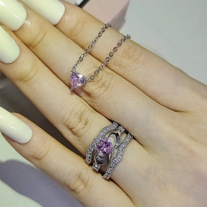 Pink heart gemstone jewelry set with Claddagh ring and matching pendant necklace