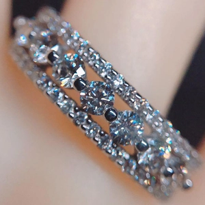 Elegant silver hollow ring with three-row cubic zirconia and a large center stone