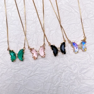 Elegant gradient crystal butterfly necklaces in four colors with delicate gold chains