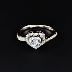 Elegant heart-shaped silver ring with large cubic zirconia and micro-pave diamonds