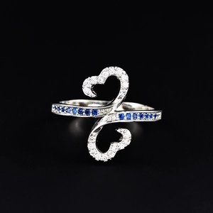 Exquisite double heart open ring in silver metal with blue gems and white cubic zirconia