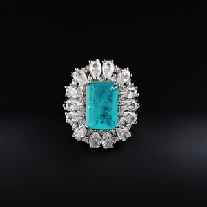 Cocktail ring with emerald-cut Paraiba tourmaline stone and sparkling white zircons