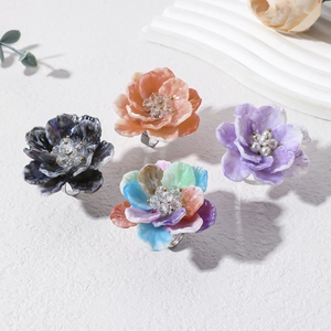 Adjustable colorful resin petal rings with crystal center in various floral designs