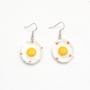 Creative fried egg dangle earrings with white resin base and yellow yolk on hooks