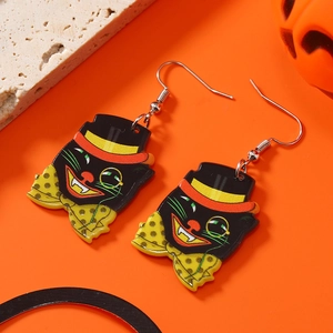 Detail of acrylic Halloween earrings featuring a tuxedo black cat with monocle and bow tie