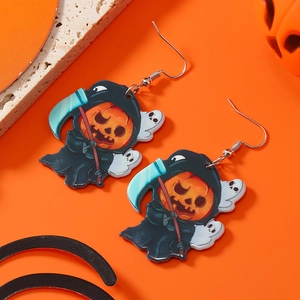 Close-up of Halloween acrylic earrings featuring cartoon pumpkin reapers on orange background