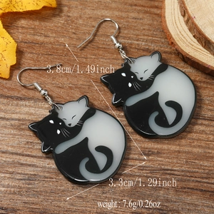 Creative black and white cat hug earrings measuring 3.8 cm high for a natural unique look