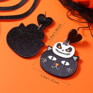 Macro detail of Halloween cat and pumpkin earrings showing dimensions of 5.0cm by 3.5cm