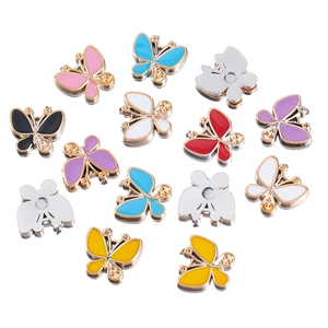 Detailed macro view of 14 colorful enamel butterfly pendants for DIY jewelry making