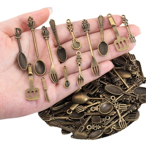 Assorted vintage bronze alloy kitchenware charms including forks and spoons for DIY jewelry