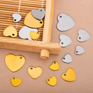 Polished stainless steel heart-shaped pendants in gold and silver for jewelry making