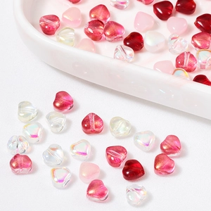 Macro detail of 6mm candy-colored heart-shaped glass beads for DIY jewelry making