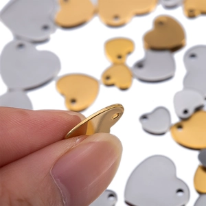 Polished heart shaped stainless steel charms in gold and silver for DIY jewelry making