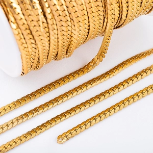 Macro shot of gold-plated stainless steel curb chain links for DIY jewelry making