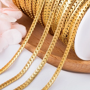 Macro detail of gold plated stainless steel flat snake chain for DIY jewelry making