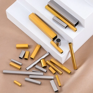Close-up of gold and silver stainless steel tubes for DIY jewelry making accessories
