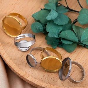 Macro view of adjustable stainless steel ring bases with flat trays for DIY jewelry making