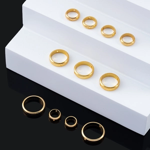 Verschiedene goldene Edelstahl-Ringverbinder mit zwei Löchern für DIY-Schmuckherstellung