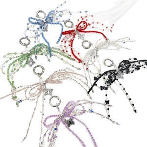 Colorful handmade acrylic crystal beaded butterfly keychains in seven vibrant styles